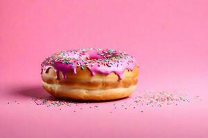 ai generado un rosquilla con rosado Formación de hielo y asperja en un rosado antecedentes foto