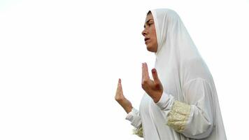 Blind Muslim Young Woman in White Prayer Outfit Praying to Allah video