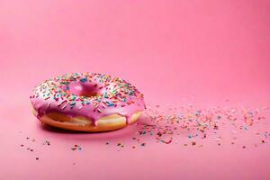 AI generated a pink donut with sprinkles on a pink background photo