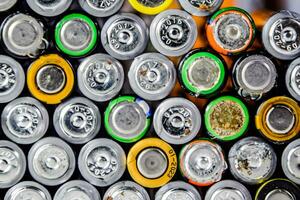 Salt and alkaline batteries, source of energy for portable technology. AAA and AA batteries photo