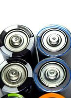 Salt and alkaline batteries, source of energy for portable technology. AAA and AA batteries photo