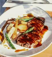 Galician beef entrecote dish with grilled vegetables photo