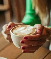 A cup of Italian-style coffee with milk ideal for the Christmas season photo