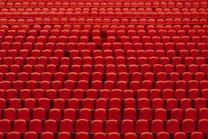 AI generated Empty cinema hall with red seats. Movie theatre. Neural network AI generated photo