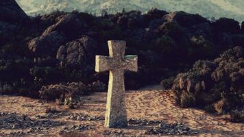 A solitary cross standing in the vastness of a desert landscape video