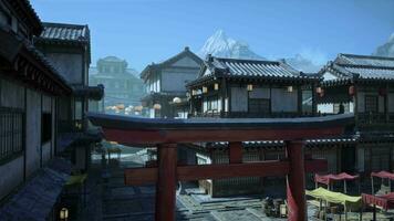 An oriental city with a red gate and mountains in the background video