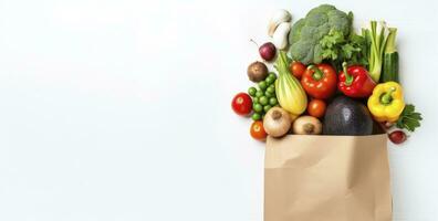 AI generated Healthy food in paper bag vegetables and fruits on white background. AI Generated photo