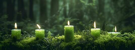 AI generated Burning candles on moss, dark green blurred the natural background. Magic candle. Generative AI photo