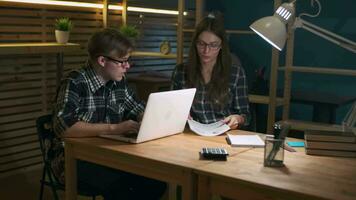Creative Business Team, Business Project, Hipster Businessmen, Remote Work, Freelance Working. Two businessmen are discussing a project while sitting at a table in a loft office video