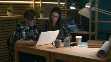 Creative Business Team, Business Project, Hipster Businessmen, Remote Work, Freelance Working. Creative design team working in loft office using tablet and laptop video