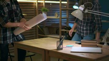 Creative Business Team, Business Project, Hipster Businessmen, Remote Work, Freelance Working. Man and woman working on a business project while sitting at the table video