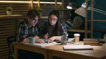 Creative Business Team, Business Project, Hipster Businessmen, Remote Work, Freelance Working. Creative design team working on a drawing in a loft office using a tablet video