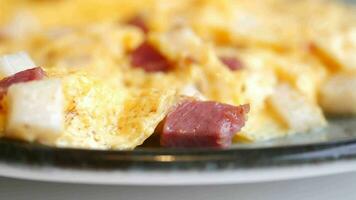 Plain Egg Omelette  with sausage on table video