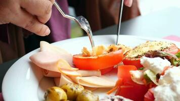 fresh vegetable salad bowl on table, video