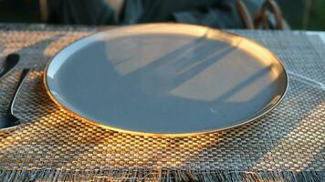 fork, knife and a circle shape plate on table video