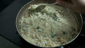 top view of cooking mushroom in a cooking pan video