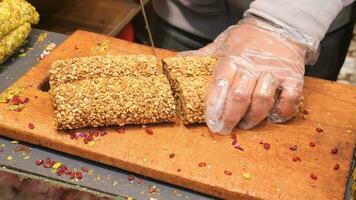 Turkish traditional sweet Turkish delight cutting in the market video