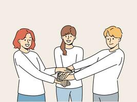 Friendly team of people holding hands demonstrate cohesion and unity, wanting to achieve goals together. Team of young guy and two girls carrying out volunteer or charitable activities vector