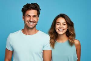 ai generado joven sonriente contento Pareja aislado en azul antecedentes estudio retrato. foto