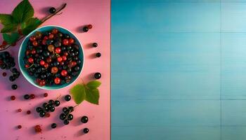 AI generated top view of a bowl full of black currants on a pink light blue work surface photo