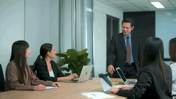 young business people discussing and brainstorming at modern office video