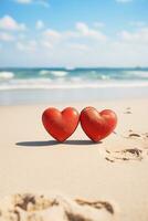 ai generado dos rojo corazones en el arena en contra el antecedentes de el Oceano en un soleado día foto