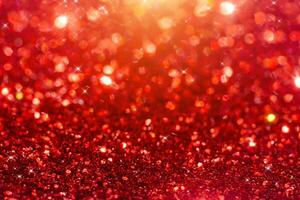 Red Sparkling Glitter bokeh Background. photo