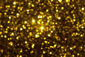 Gold Sparkling Glitter bokeh Background. photo