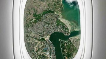 Satellite Dar es Salaam map background loop. Airplane salon passenger seat window view. Spinning around Tanzania city plane cabin air footage. Seamless panorama flies over terrain backdrop. video