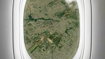 Satellite Dhaka map background loop. Airplane salon passenger seat window view. Spinning around Bangladesh city plane cabin air footage. Seamless panorama flies over terrain backdrop. video