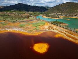 Aerial view of Mining activity. Apocalypse scenery. Earth destruction. Disruption of nature.  Extracting natural resources from the Earth to sell on the world market. Ecological disaster. photo