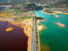 Aerial drone view of Mining activity. Apocalypse scenery. Earth destruction. Disruption of nature.  Extracting natural resources from the Earth to sell on the world market. Ecological disaster. photo