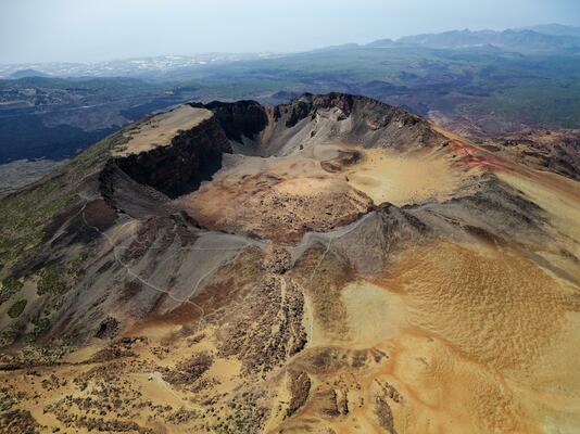 Aerial view of Pico Viejo volcano in Tenerife, Canary Islands, Spain. Pico Viejo has a spectacular 800 meters diameter crater. Famous destinations for hikers.