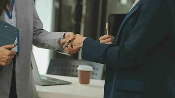 Business team collaboration discussing working analyzing with financial data and marketing growth report graph in team, presentation and brainstorming to strategy planning making profit of company. video