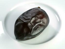 Close up a black dry date palm. photo