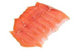 Macro photo of salmon cut into thin slices. Fish isolate.