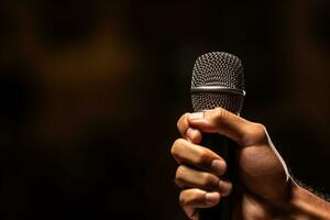 AI generated close up of hands holding a microphone with Generated AI photo