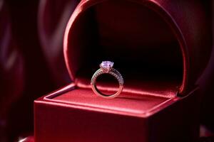 AI generated a diamond wedding ring in a red purple box bokeh style background with Generated AI photo