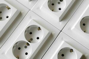 White double European high voltage 220W sockets. photo