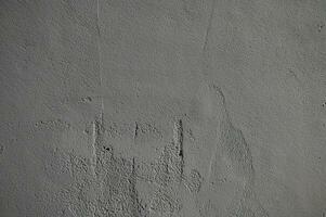 Clásico grunge gris antecedentes de natural cemento o Roca antiguo textura como retro modelo pared. eso es conceptual o metáfora pared bandera, material, Envejecido, oxido o construcción foto