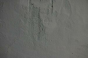 Clásico grunge gris antecedentes de natural cemento o Roca antiguo textura como retro modelo pared. eso es conceptual o metáfora pared bandera, material, Envejecido, oxido o construcción foto