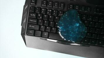 Blue soft gel cleaning dust on keyboard. photo