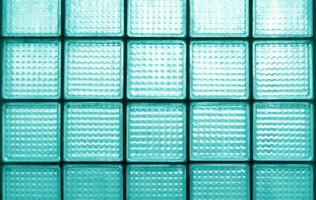 Light blue surfaces dirty glass block wall for effect background. photo