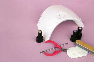 Set for manicure. Lamp for nails. photo