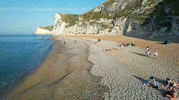 Most Beautiful High Angle Time Lapse Footage of British Landscape and Sea View of Durdle Door Beach of England Great Britain, UK. Captured with Drone's camera on September 9th, 2023 video