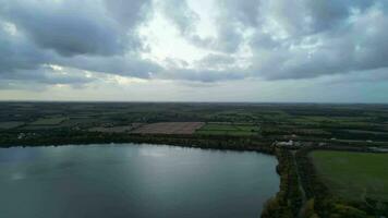 Aerial Time Lapse Footage of British Countryside Village's Landscape of Bedfordshire, England, United Kingdom. October 30th, 2023 video