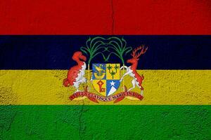 Flag and coat of arms of Republic of Mauritius on a textured background. Concept collage. photo