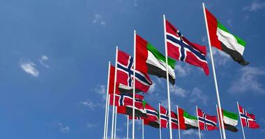 Norway and United Arab Emirates, UAE Flags Waving Together in the Sky, Seamless Loop in Wind, Space on Left Side for Design or Information, 3D Rendering video