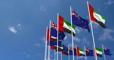 New Zealand and United Arab Emirates, UAE Flags Waving Together in the Sky, Seamless Loop in Wind, Space on Left Side for Design or Information, 3D Rendering video