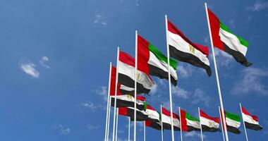 Egypt and United Arab Emirates, UAE Flags Waving Together in the Sky, Seamless Loop in Wind, Space on Left Side for Design or Information, 3D Rendering video